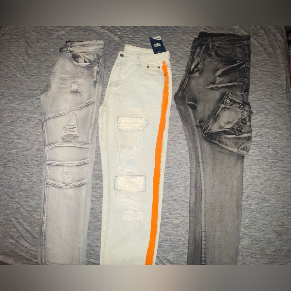 Men’s Distressed Slim Fit/Stacked Trio
All size 34